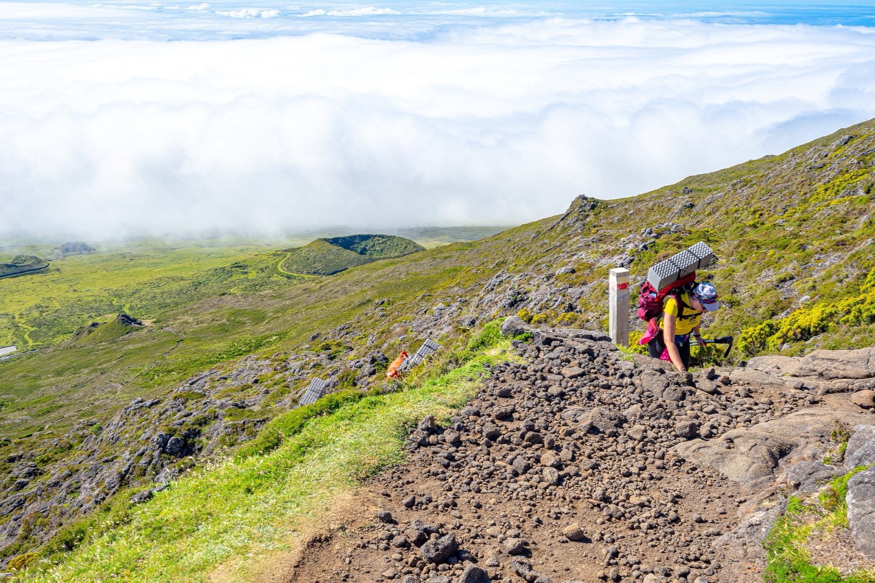 A hiker on the slope of Mount Pico