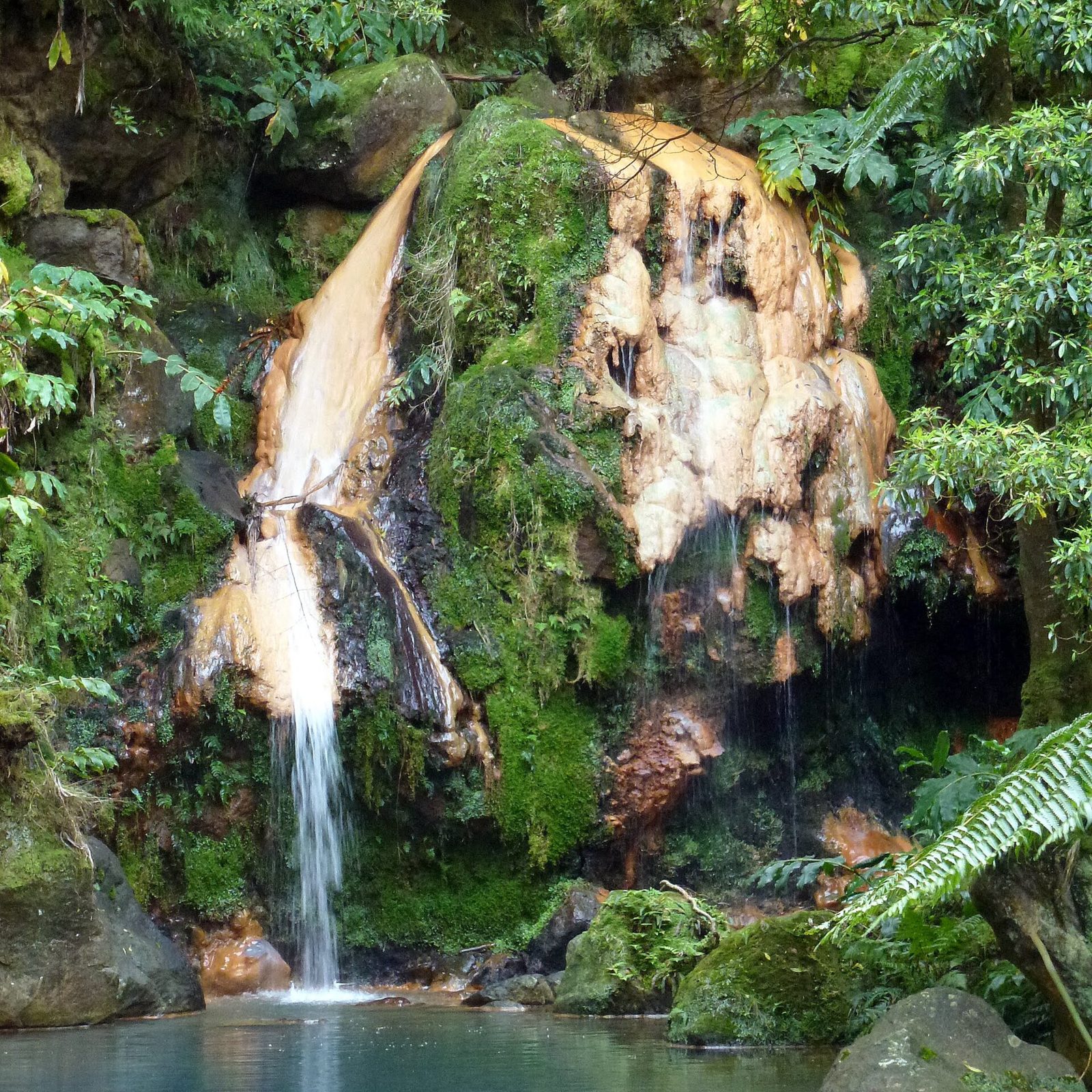 The iron-stained waterfall at Caldeira Velha above Ribeira Grande